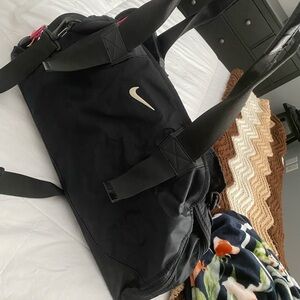Nike women’s Black Duffle Bag with Shoulder Strap